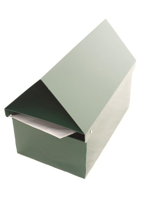View from Above of Elongated Green Mailbox in Shape of House with Letter Peaking from Slot on White Background