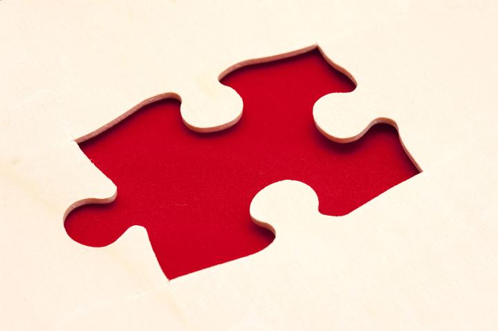 A jigsaw otherwise completed with just one single missing piece