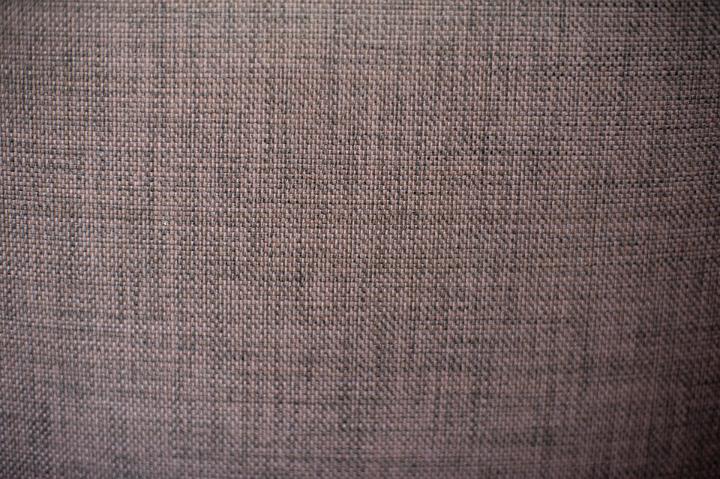 woven textile background texture in muted purple
