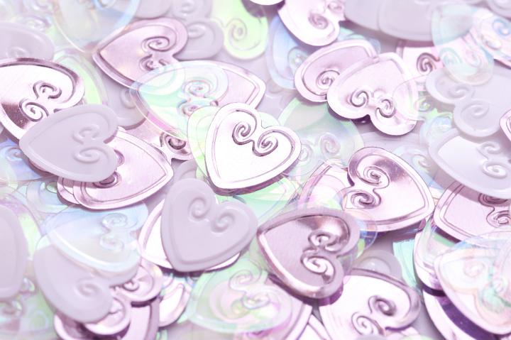 Pink hearts wedding decoration confetti in close-up