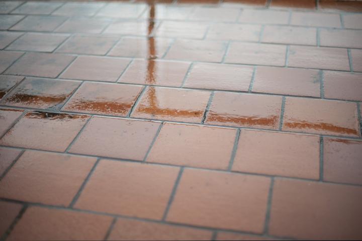 Architectural Detail of Reflection in Wet Outdoor Patio Tiles in the Rain