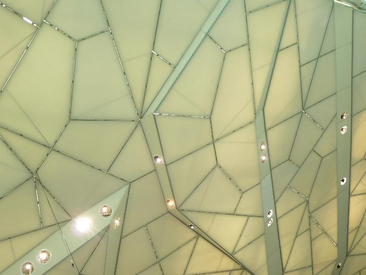 Abstract View of Random Architecture, Ceiling with Geometric Pattern and Illuminated Pot Lights