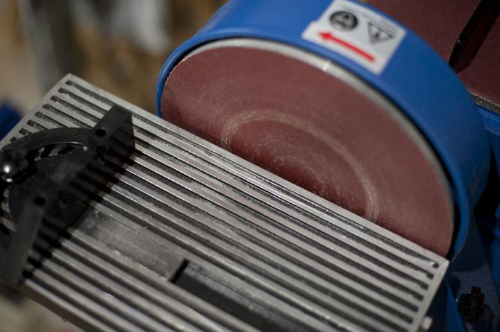 Sanding wheel with bench in close-up view