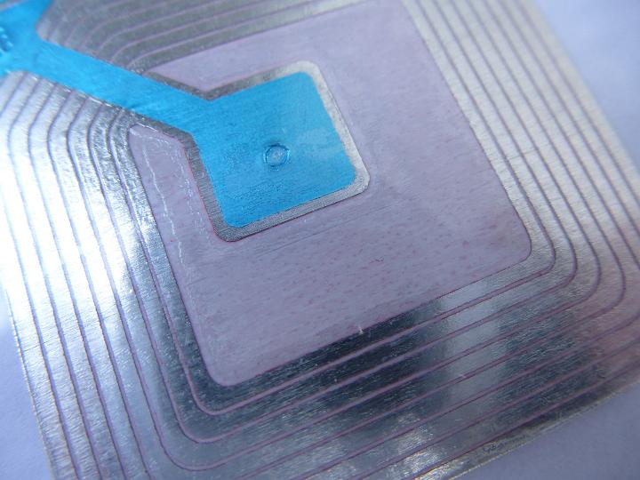 An electromagnetic retail security label showing an radio antenna loops