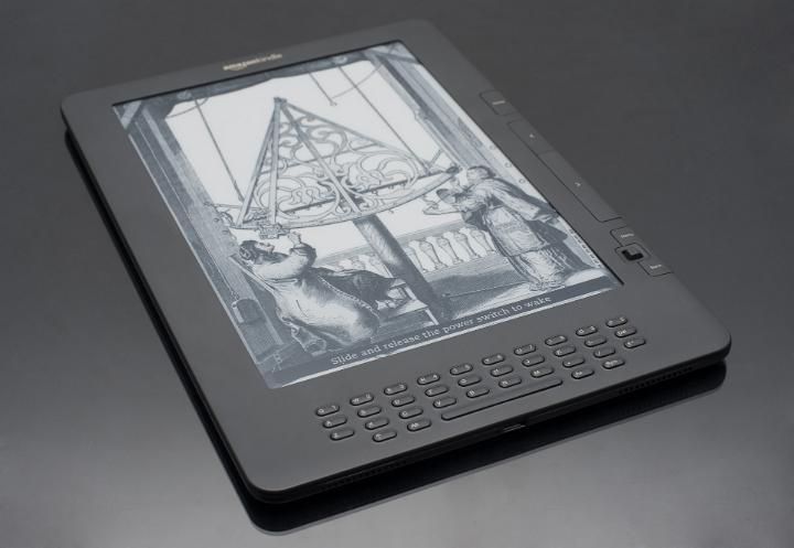 Illustration on Screen of E Ink Electronic Book Reader, Still Life on Grey Background