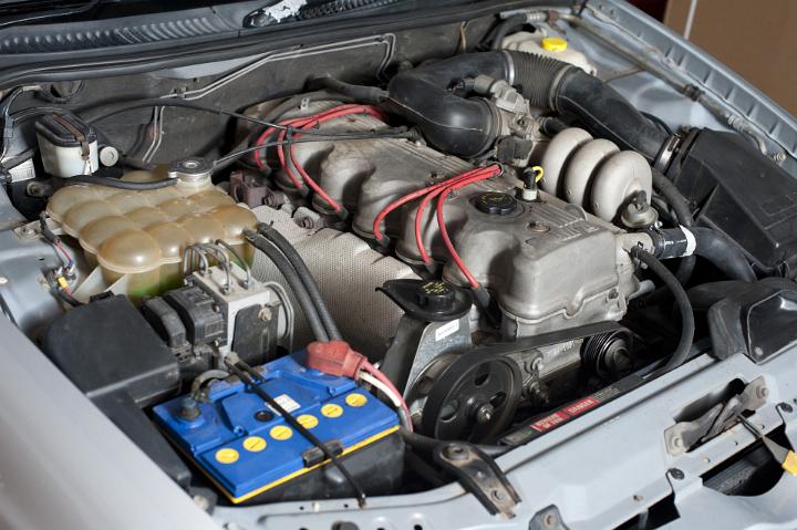 Detail of Car with Raised Hood Showing Engine Components
